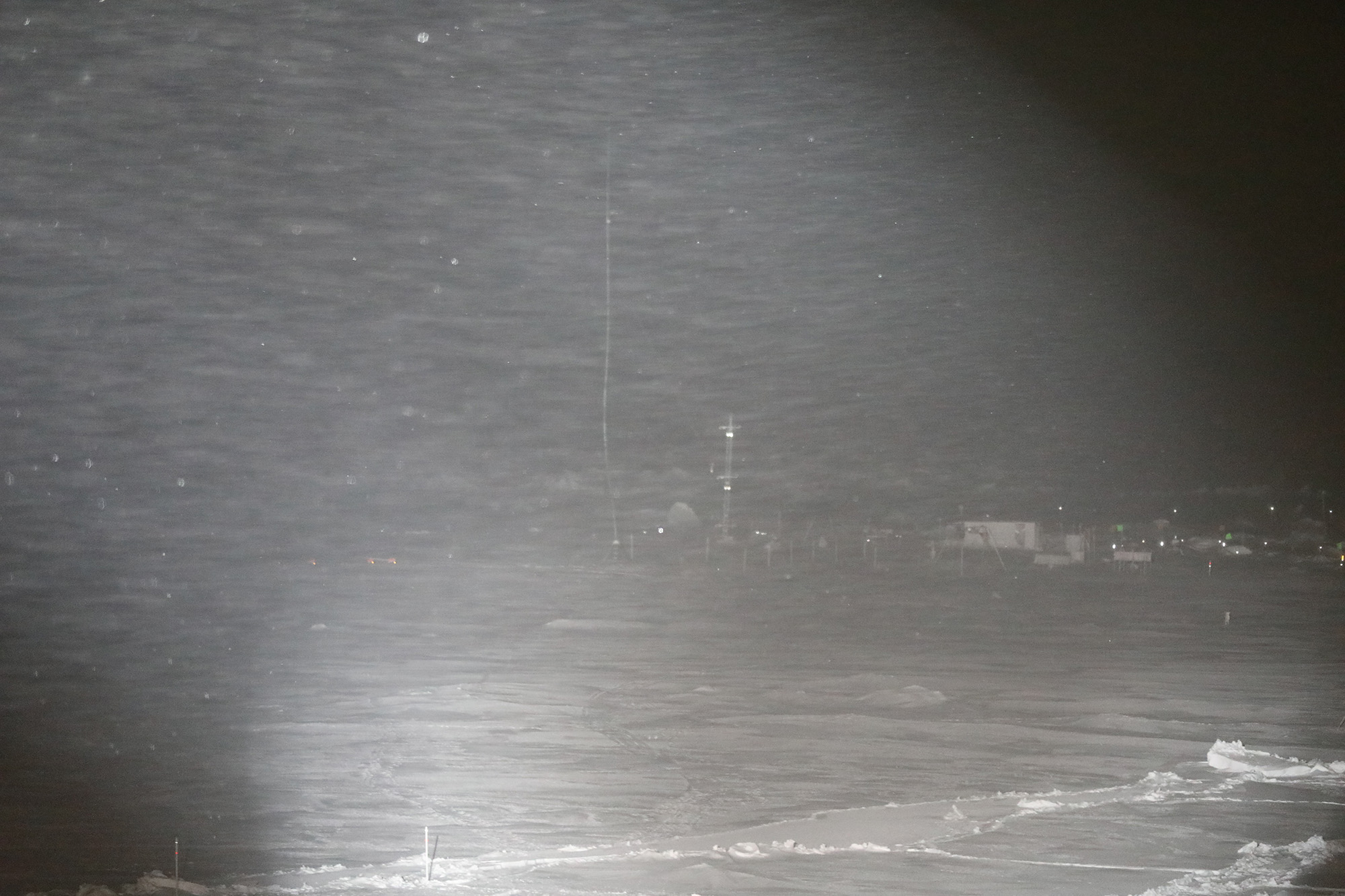 Blowing snow makes it difficult to see instruments on the sea ice during the MOSAiC expedition.