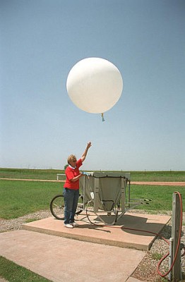 24 Operations staff at the SGP site release weather balloons 4 times a day, Monday through Friday, all year round. During VORTEX2, they will supplement these with additional launches as conditions warrant. Image courtesy of Mark Roberts Photography.