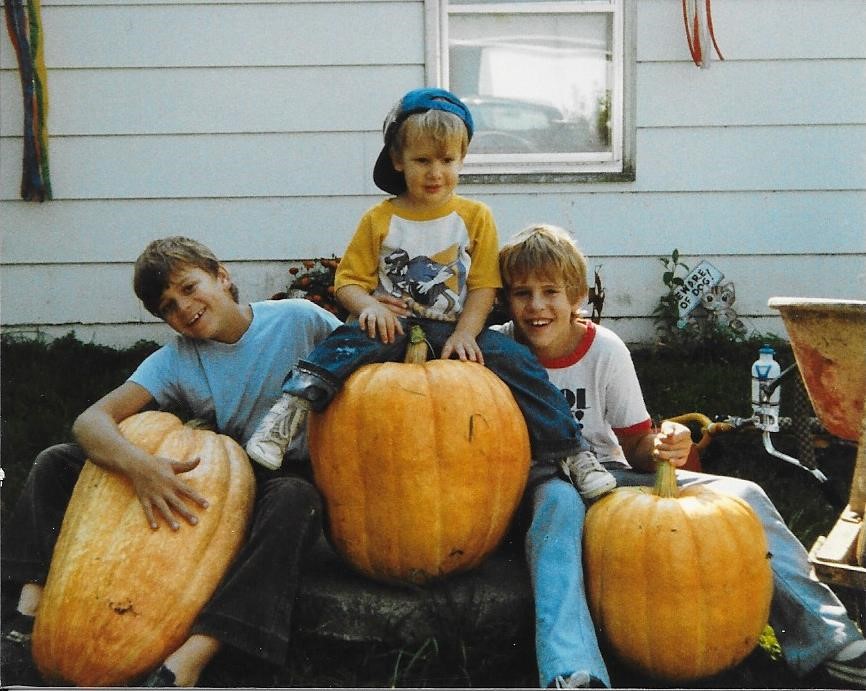 Adam Theisen with his brothers