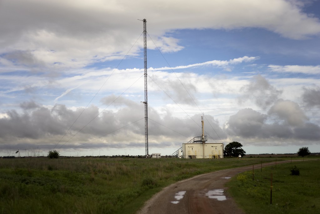 A 60-meter tower stands tall at the Southern Great Plains Central Facility, next to the Aerosol Observing System.