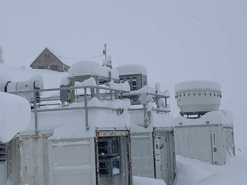 Snow buries the ARM Mobile Facility site at Gothic.