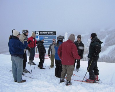 group-thunderhead Dr. Jay Mace (far right), lead scientist for the STORMVEX campaign, leads the group discussion outside Thunderhead Lodge where many AMF2 instruments will be deployed. ARM file photo.